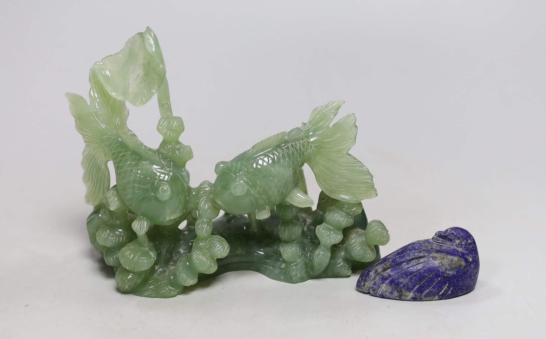 A Chinese bowenite jade goldfish group, 17cm wide, and a lapis lazuli figure of a duck